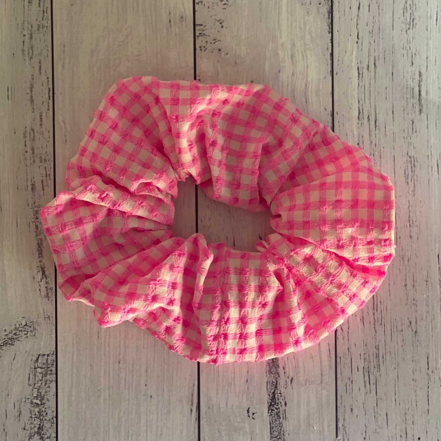 The cute neon pink and white scrunchie is fun and fabulous. Handmade by zabel designs. 