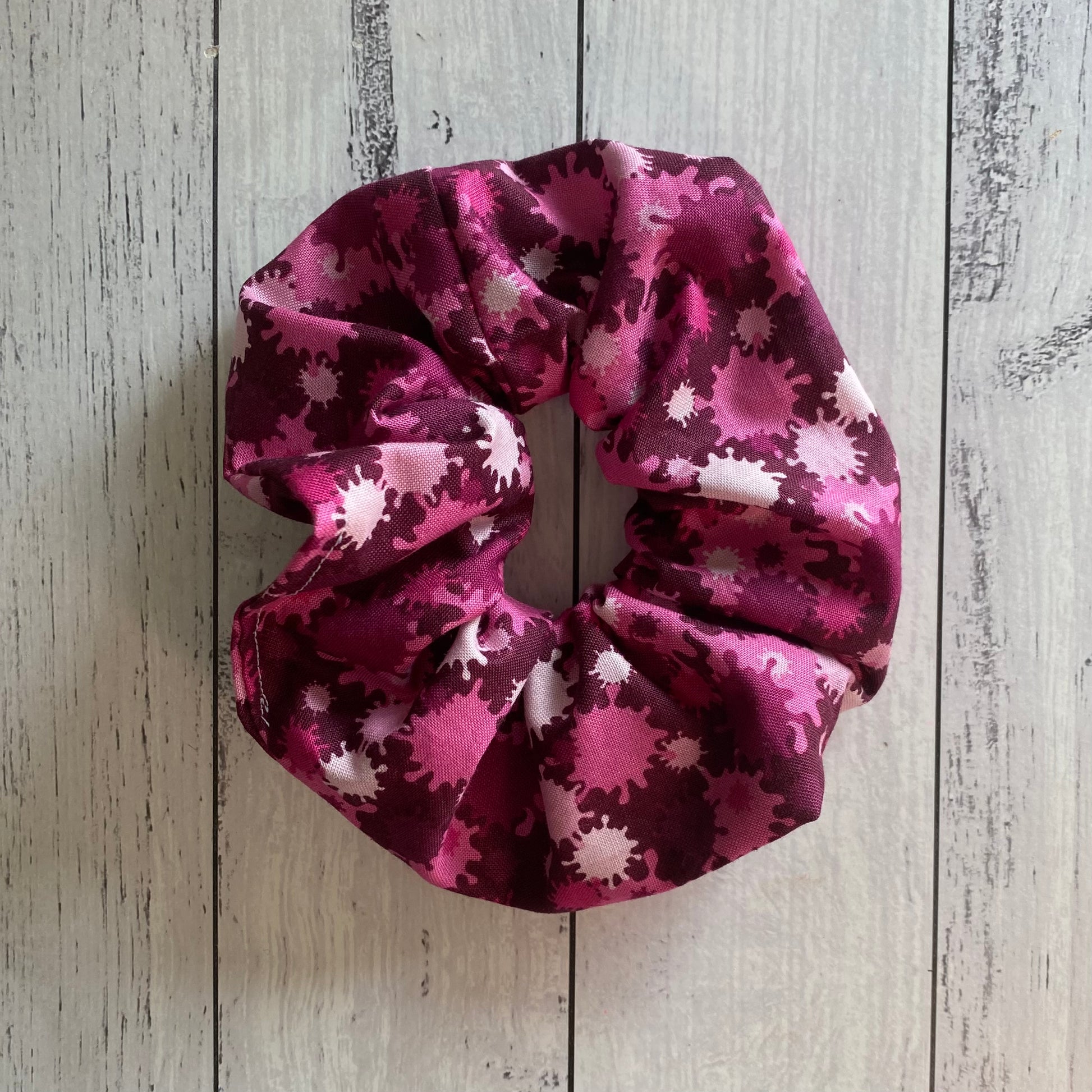 Pinks And white tones creating a fun commando scrunchie. All handmade by zabel designs. 